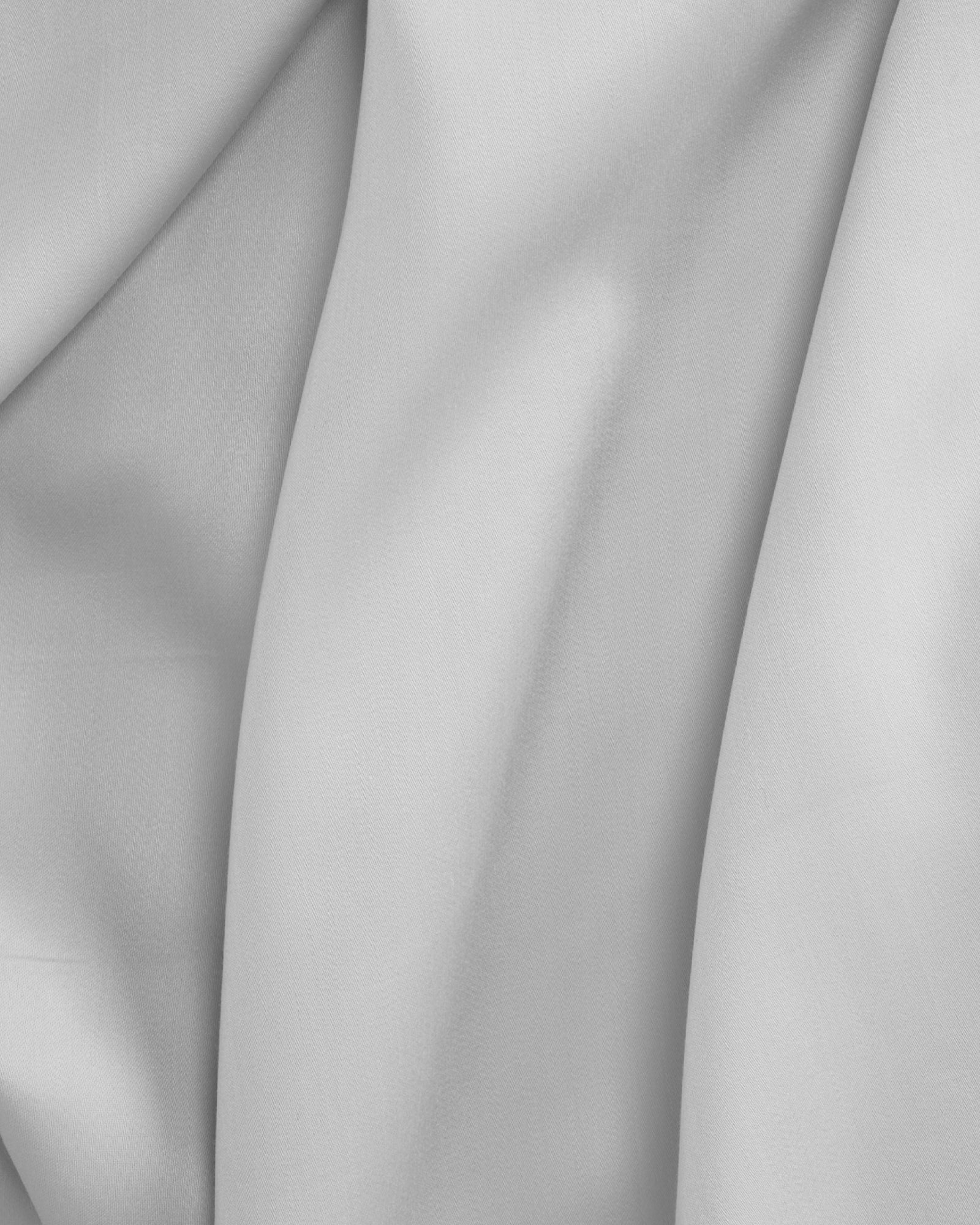 Soft white Tencel sateen duvet cover with smooth, luxurious texture and subtle sheen.