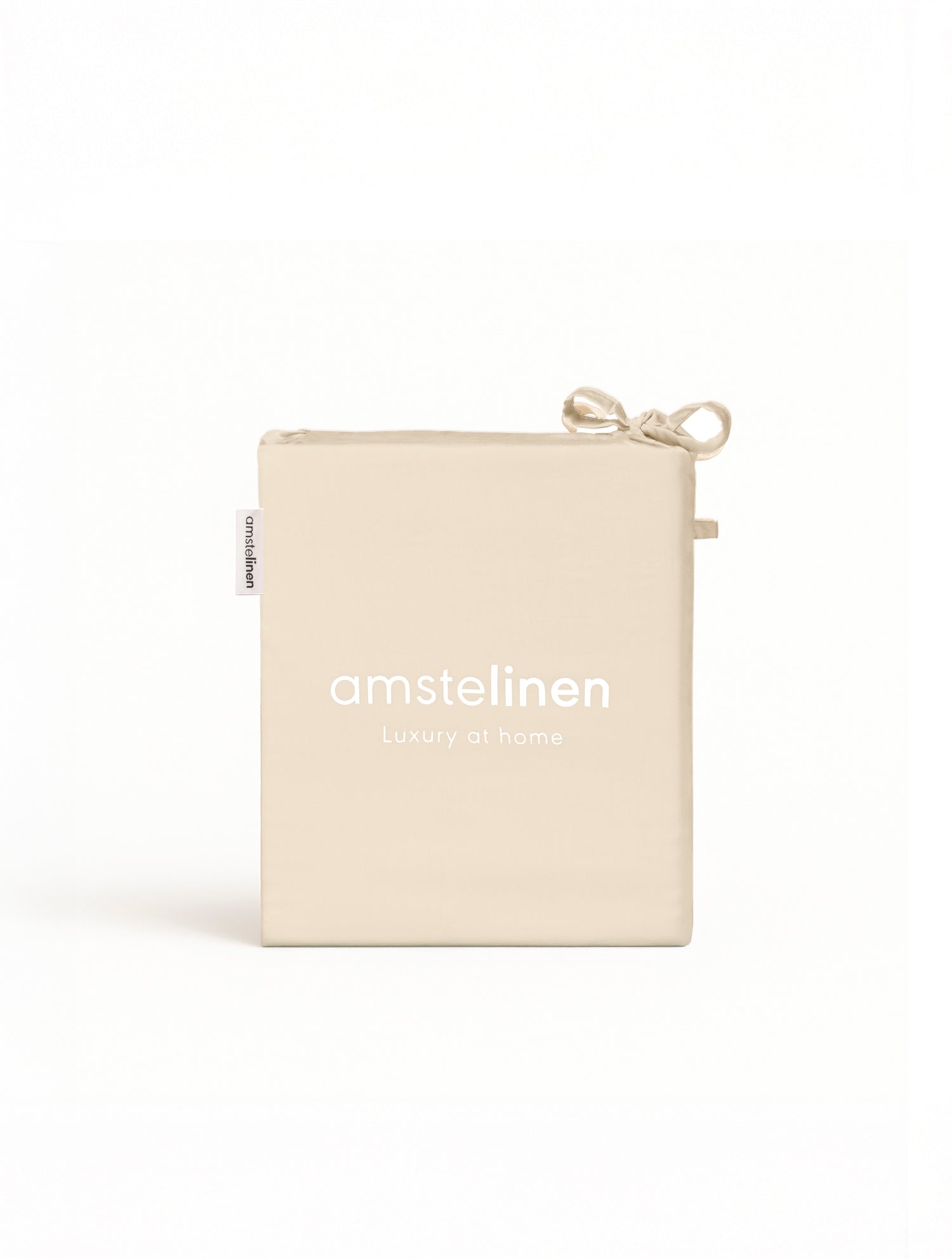 Classic ivory folded flat sheet with subtle texture and tied edges.