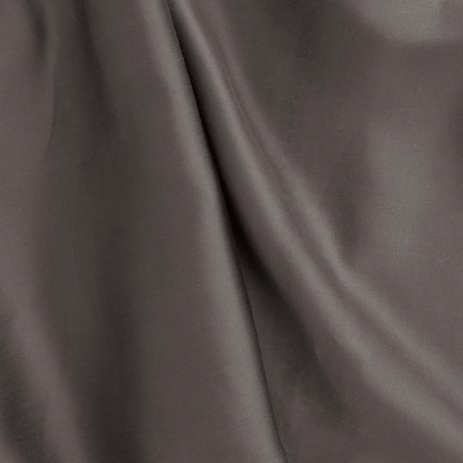 Smooth dark grey Tencel™ sateen pillowcase with a subtle sheen and soft drape.
