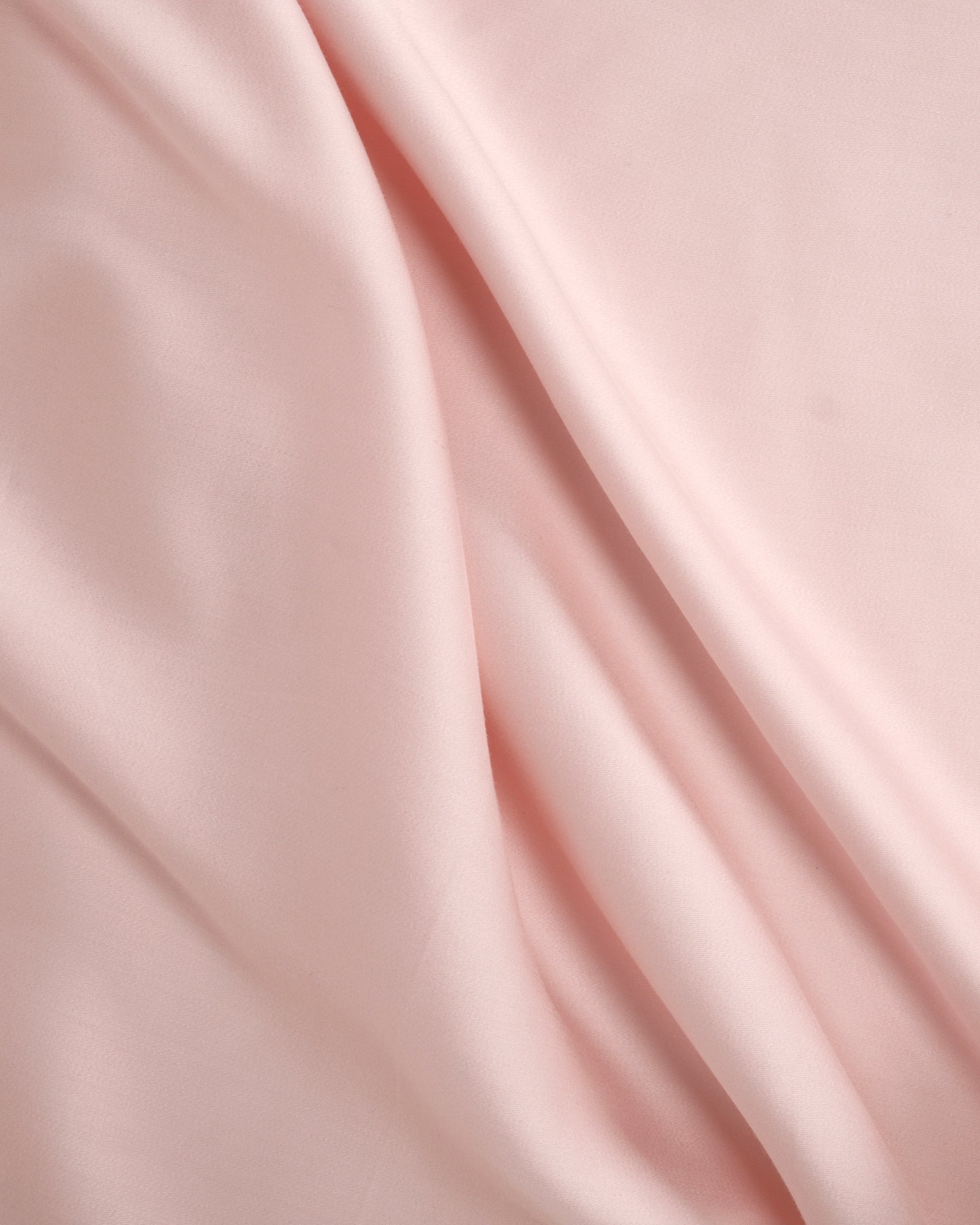 Soft Whisper Rose Tencel sateen duvet cover with smooth, flowing texture.