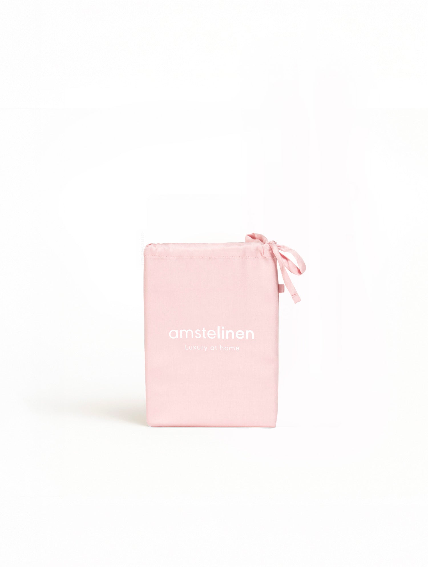 Soft pink satin pillowcase pouch with a drawstring closure and subtle white logo text.